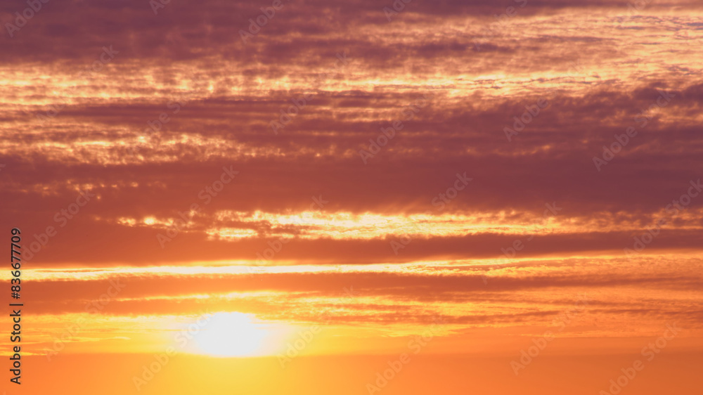 Sunset is a beautiful view of the horizon, when the sunlight gives way to a colorful dusk with red clouds.
