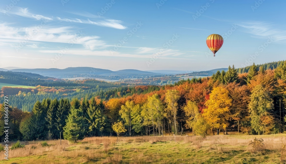 Magical Autumn Scene: Hot Air Balloon Over Pilgramsberg in Bavarian Forest Magical Autumn Scene: Hot Air Balloon Over Pilgramsberg in Bavarian Forest