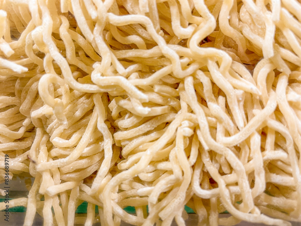 Close up view raw asian ramen noodle background texture