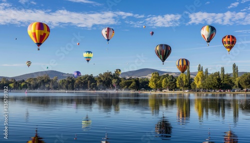 Magical Moments in the Sky: Hot Air Balloons Soar Above Lake Burley Griffin in Canberra Festival photo