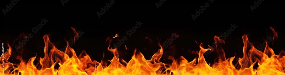 The burning flames are isolated on a black background
The burning flames are isolated on a black background