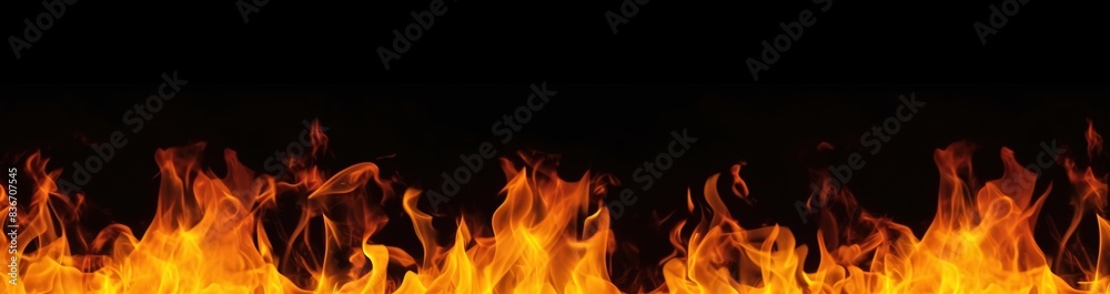 The burning flames are isolated on a black background
The burning flames are isolated on a black background