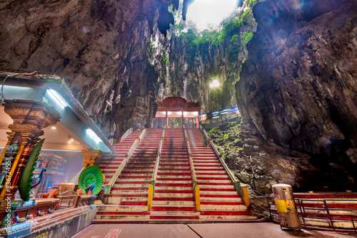 Photography Stairway leading down into interior of Batu Caves,and Hindu temple inside,Kuala Lumpur,Malaysia