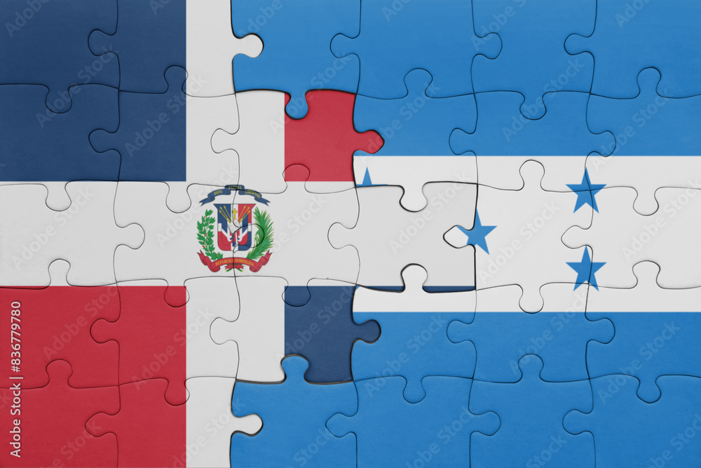 puzzle with the colourful national flag of honduras and flag of dominican republic . puzzle with the colourful national flag of honduras and flag of dominican republic .