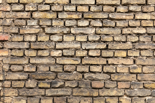 pattern of old grungy dirty brick wall photo