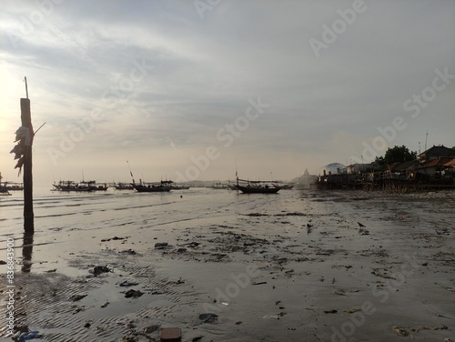 Morning atmosphere on Tuban beach, East Java, Indonesia photo