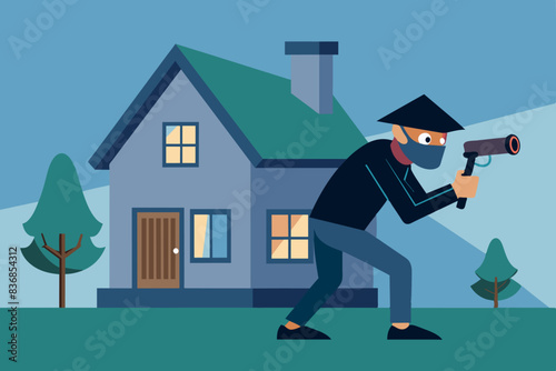 a thief with a crowbar near the house at night. The man is wearing a hat, mask and gloves, he is trying to break into the house. safety and security atmosphere