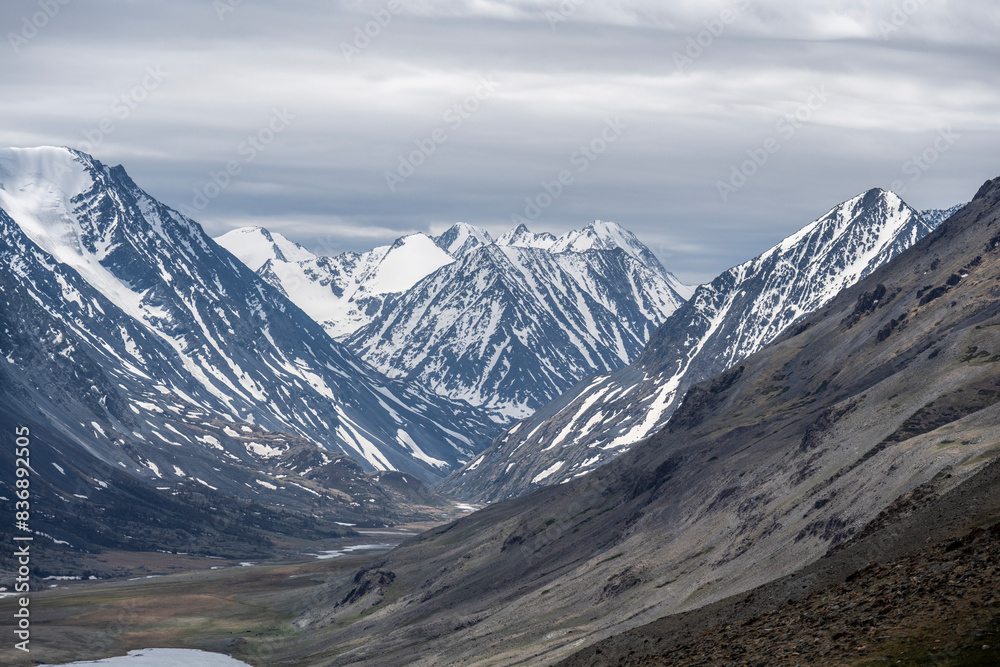 landscape of the surroundings of the village of Kosh Agach mountains with lakes and unusual landscapes in the southern regions of Altai in May landscape of the surroundings of the village of Kosh Agach mountains with lakes and unusual landscapes in the southern regions of Altai in May