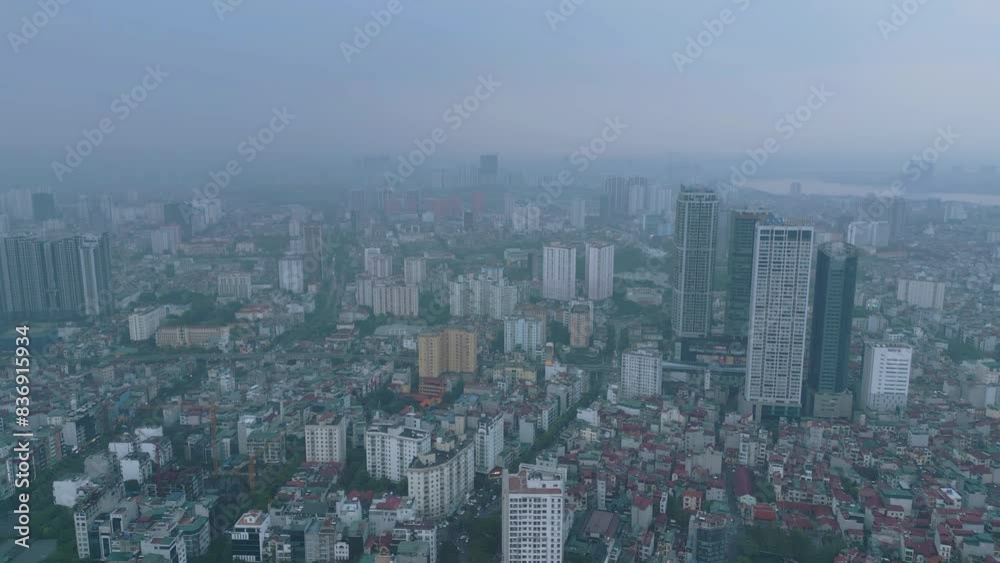 Aerial view of residential neighborhood roofs. Urban housing development from above. Top view. Real estate in Hanoi City, Vietnam. Property real estate. Aerial view of residential neighborhood roofs. Urban housing development from above. Top view. Real estate in Hanoi City, Vietnam. Property real estate.