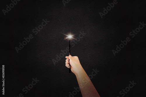 Fotografia hand holding Magic wand, spells, magic, sketches, black and white, casting spell