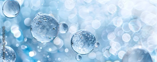 blue spheres of oil floating in the air, oil bubblesagainst a white background
