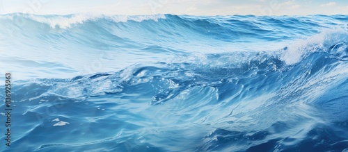 An ocean water background with a sea wave and copy space image.