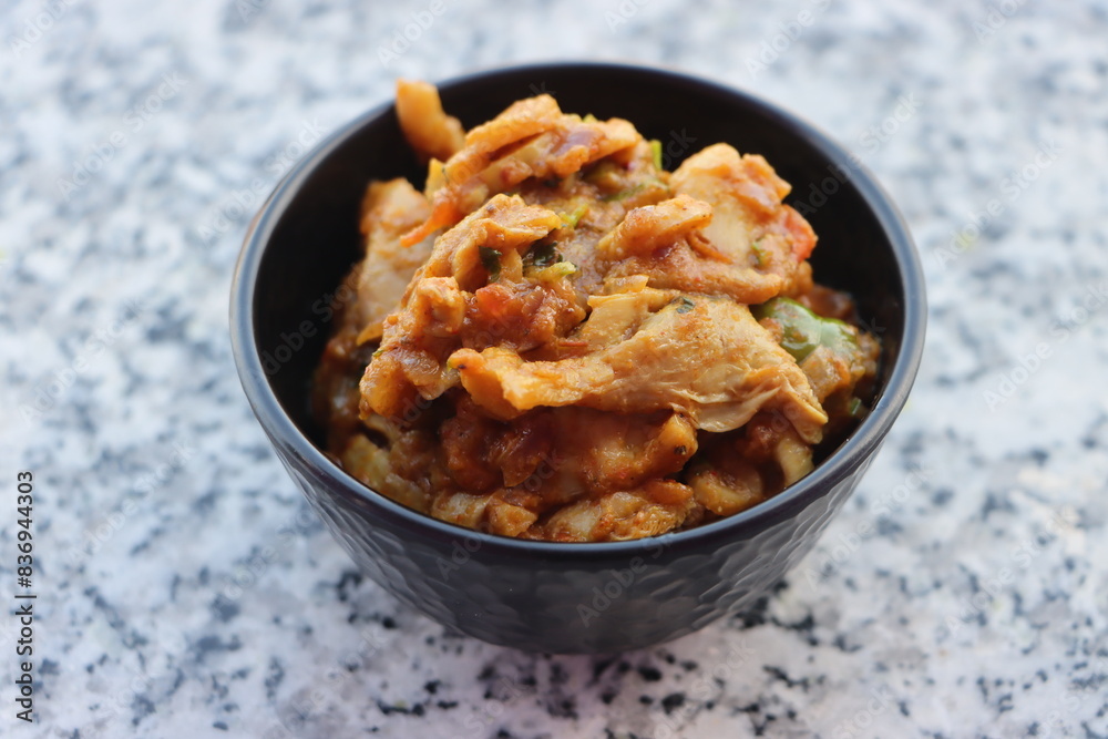 Oyster mushroom masala, pleurotus mushroom curry, cooked in Indian sauce Oyster mushroom masala, pleurotus mushroom curry, cooked in Indian sauce