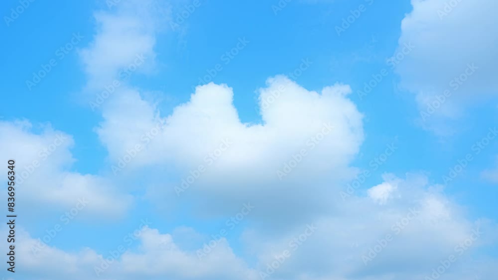 The calming effect of light clouds whisking across the blue sky in a time-lapse that captures a relaxing summer day. Climate change concept. Cinematic footage. Timelapse. Sky background. 4K HDR.
The calming effect of light clouds whisking across the blue sky in a time-lapse that captures a relaxing summer day. Climate change concept. Cinematic footage. Timelapse. Sky background. 4K HDR.
