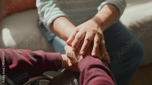 closeup old senior husband face Close up mature couple holding hands, loving caring wife supporting comforting senior aged husband, family expressing empathy and understanding, trusted relationship  photo