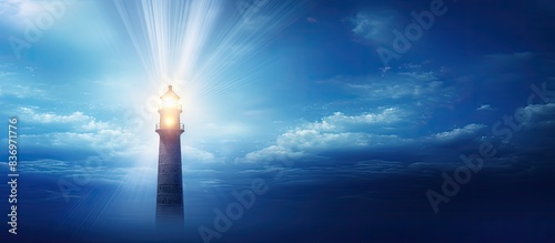 A beacon shining brightly against the backdrop of the blue sky, with plenty of copy space image.