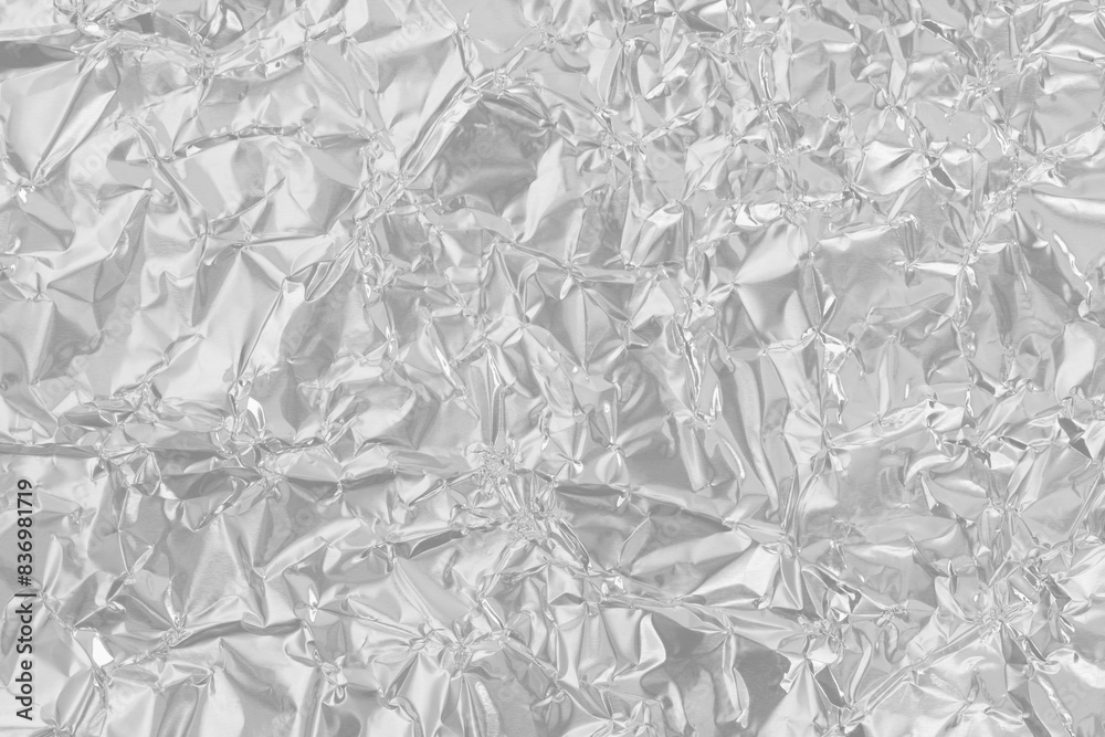 Shiny silver foil texture background, pattern of wrapping paper with crumpled and wavy. Shiny silver foil texture background, pattern of wrapping paper with crumpled and wavy.