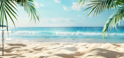 Abstract Summer Background with Golden Sand and Palm Leaves on the Beach and Blurred Sea in the Distance for Vacation Concept Banner © Li