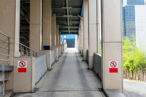 Car ramp leading up to a parking deck