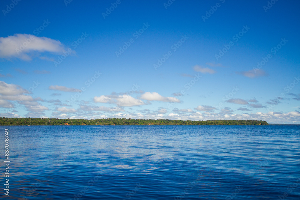 Scenic Views of the Negro River: Discover the tranquil beauty and rich biodiversity of this Amazonian tributary, ideal for travel and environmental-themed projects
