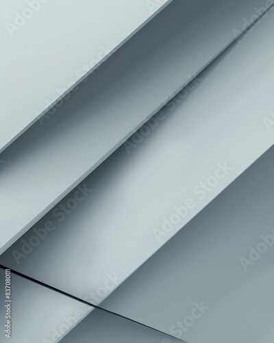 An abstract background featuring smooth geometric shapes in shades of grey  creating a modern  minimalist  and elegant design with a dynamic and structured appearance.