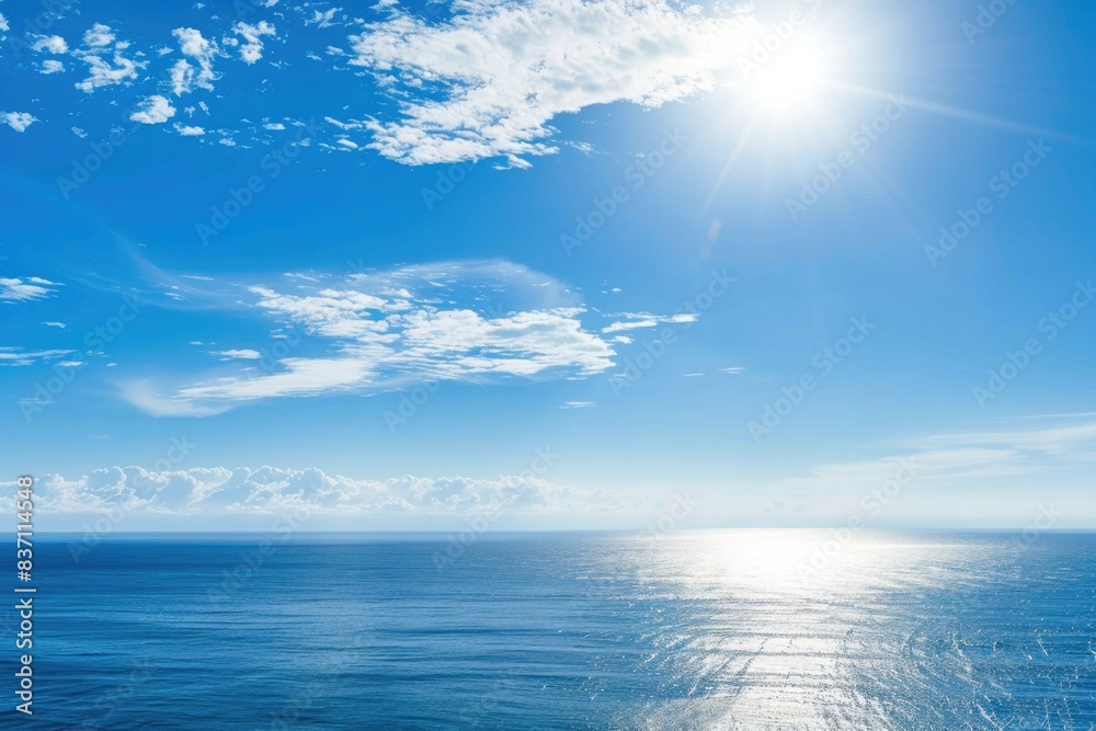 Obraz premium Horizon Blue Sky. Serene Ocean and Sky with Calm Water and White Sun