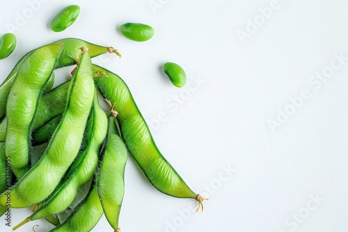 Top View of Vibrant Green Pods on Clean Background photo
