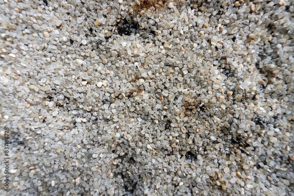 White sand and small pebbles for background