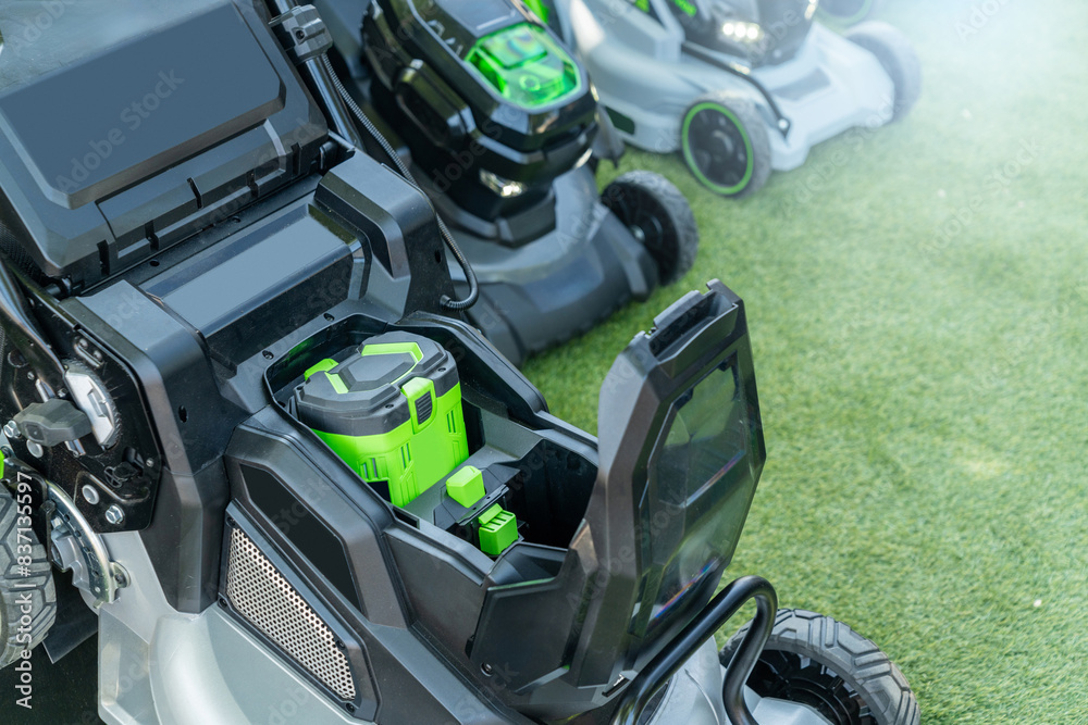 Battery-powered electric lawn mowers. Battery-powered electric lawn mowers.