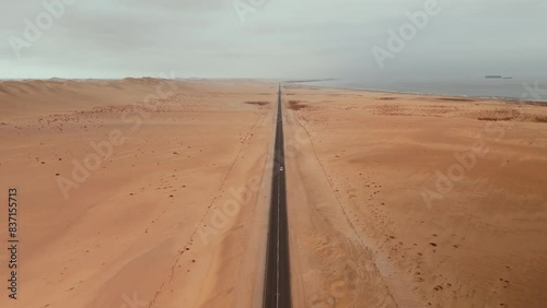 Straight, long road in the desert.