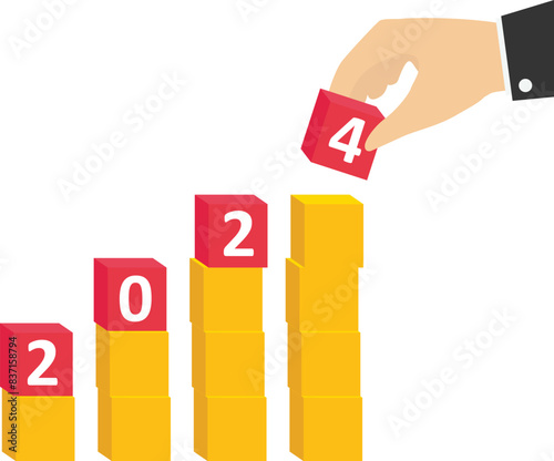 Hand putting a cube on up arrows, which printed No.2024 Target of new year and business concept.
