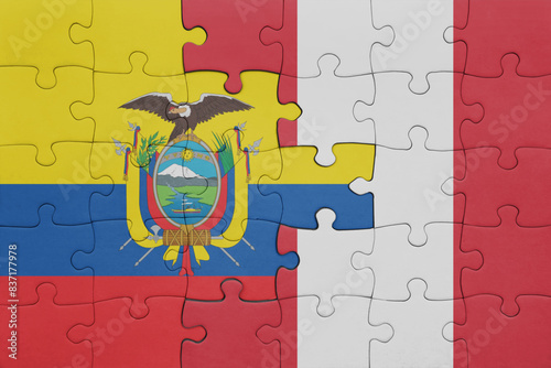 puzzle with the colourful national flag of peru and flag of ecuador.