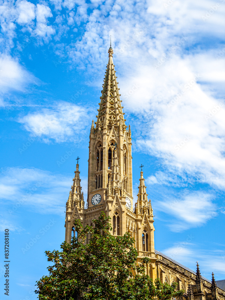 Fototapeta premium The bell tower of the Buen Pastor Cathedral (The Good Shepherd cathedral) of San Sebastian. Gipuzkoa, Basque Country, Spain.