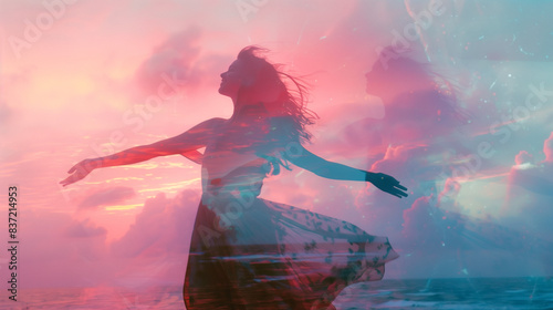 Woman dancing. Pink sunset background. Silhouette