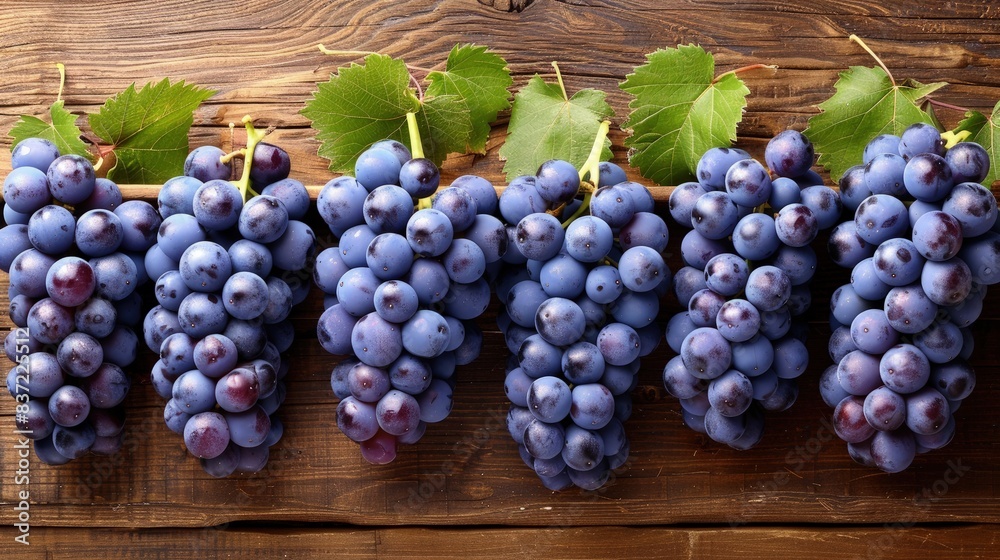 Rustic Display of Vibrant Blue Grapes on Wooden Surface Rustic Display of Vibrant Blue Grapes on Wooden Surface