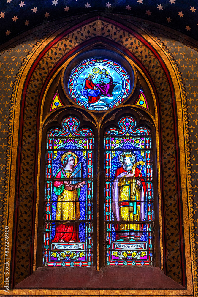 Obraz premium Stained glass window in the church of Mirepoix in Languedoc Roussillon in the south of France