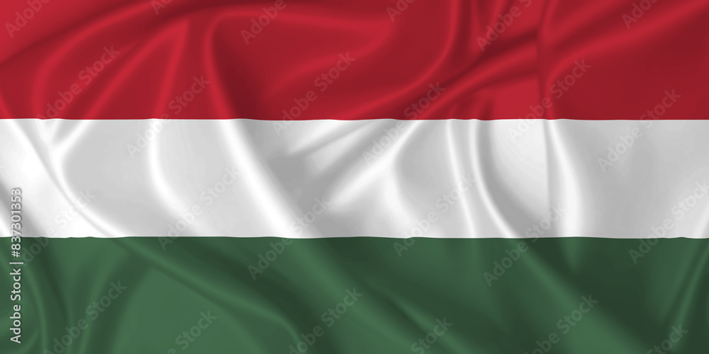 Flag of Hungary waving in the wind on silk texture