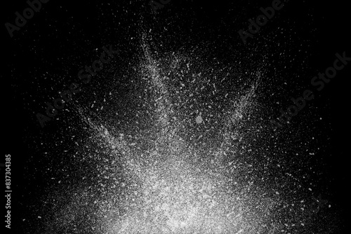 Freeze motion of white powder exploding photo