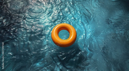 A Single Yellow Inflatable Ring Floating in a Blue Pool on a Sunny Day