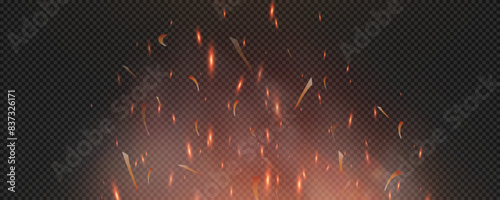Burning hot sparks effect with embers burning ash and smoke flying in the air. Burning glowing particles. Flame of fire with sparks isolated on a black transparent background. Flame png.