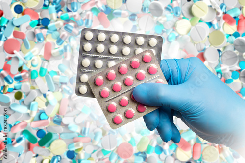 Doctor hand with pills. Vit...