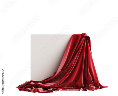 Empty cube with red silk cloth isolated on background.