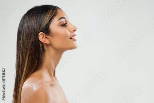 Beauty Girl Face Side View. Beautiful Indian Woman Profile over White. Women Chin and Neck Skin Facelift Massage. Nose Aesthetic Plastic Surgery