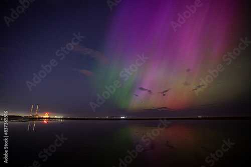 Photography Multi-coloured northern lights / aurora over Dublin Poolbeg chimneys in Ireland