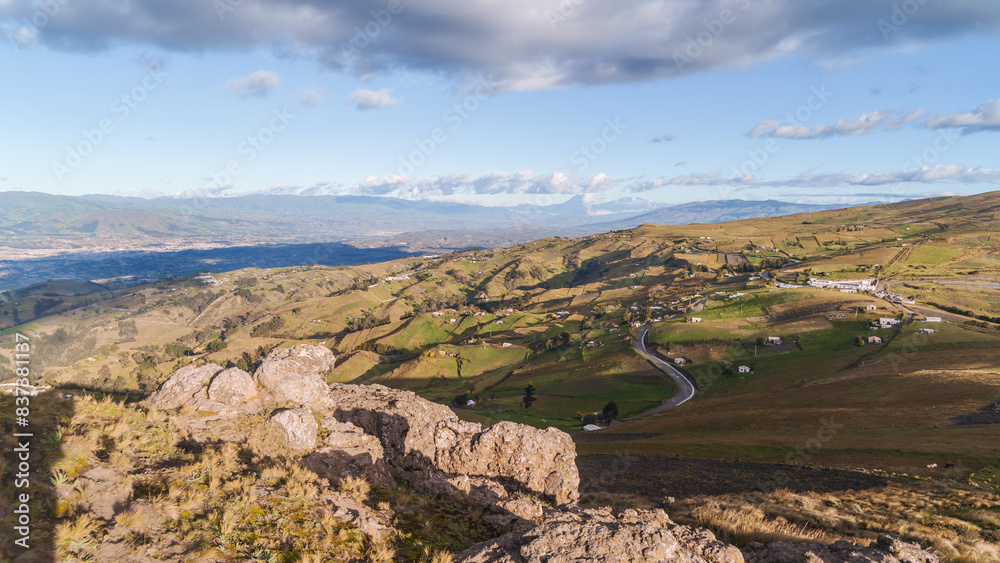 Fototapeta premium Landscape from the heights, with hills and the bright sun