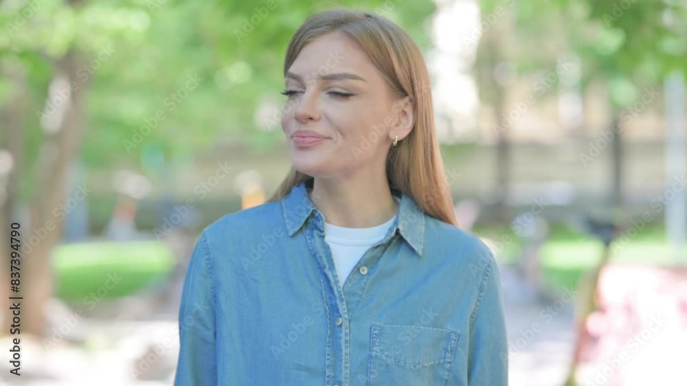 Yawning Young Woman Outdoor in Park Yawning Young Woman Outdoor in Park