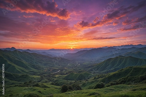 golden hour as the sun dips below the mountain range. © Photographer