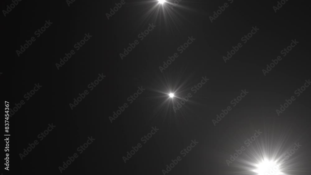 Photographer camera flashes. Random bright blinking lights. Flashing lens flares. Seamless loop