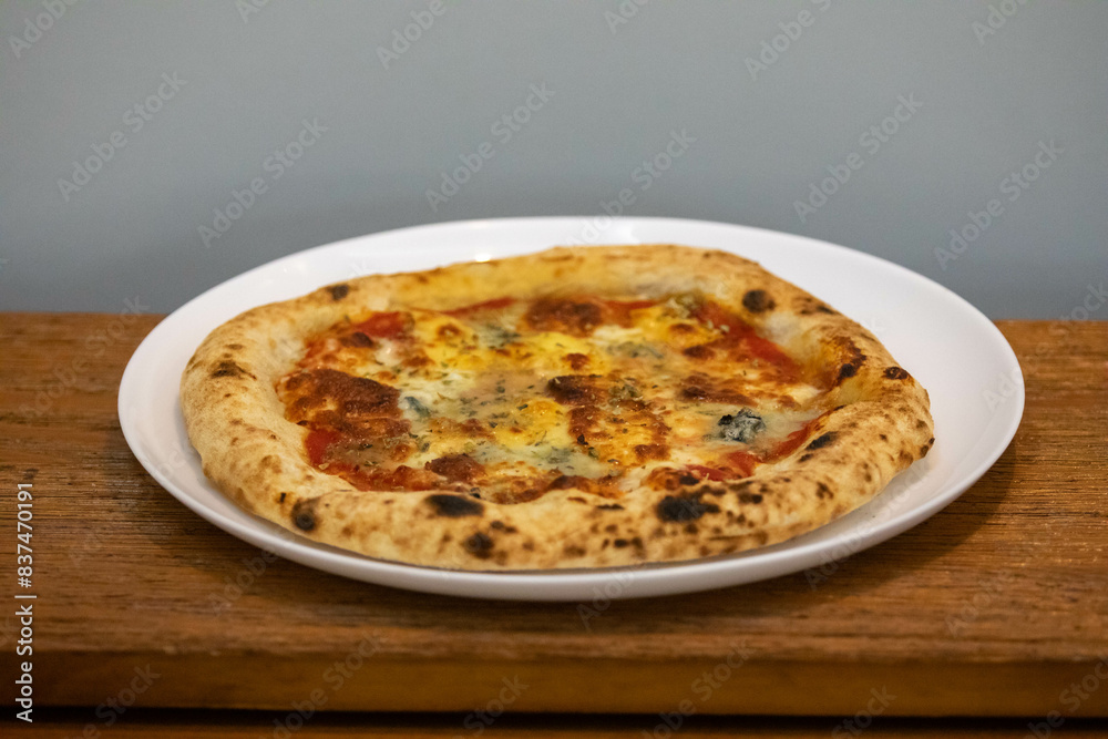 Traditional artisanal pizza with long-maturing dough Traditional artisanal pizza with long-maturing dough