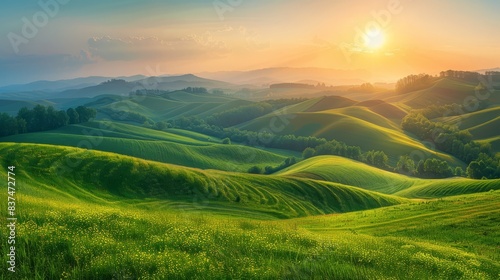 Sunset over rolling hills, warm light, serene atmosphere, natural beauty, copy space